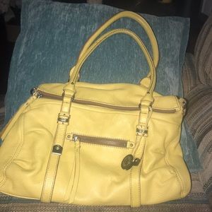 Yellow sak purse rarely used